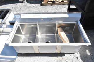 Alt text: Advance Tabco FC-3-1620 stainless steel 3 bay sink, brand new with minor dents, visible labels, durable commercial use.