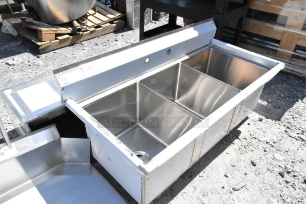 BRAND NEW Advance Tabco FC-3-1620 stainless steel 3-bay sink, commercial use, visible scratches, sturdy construction.