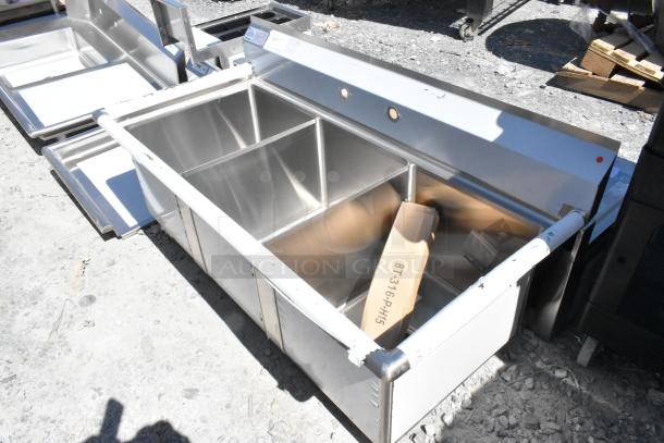 Brand new Advance Tabco FC-3-1620 stainless steel commercial 3 bay sink with visible scratch and dent, available for auction.