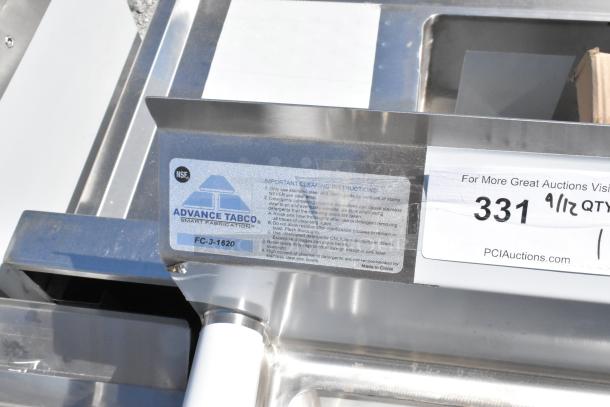 Advance Tabco FC-3-1620 stainless steel 3 bay sink with scratch and dent. NSF label visible. Commercial use.
