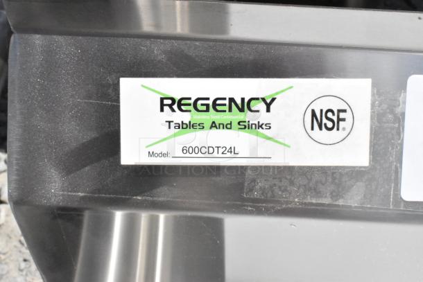 Regency 600CDT24L 16 Gauge Clean Dish Table, left drainboard, scratch and dent condition, no legs, NSF certified label.