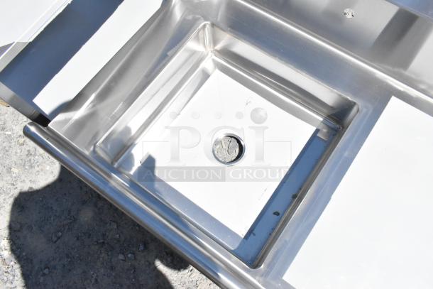 BRAND NEW Regency 600DDT48R 16 Gauge 4' Dish Table, right drainboard, no legs, stainless steel; visible scratches.