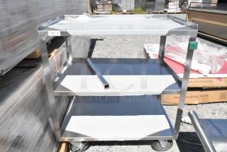 BRAND NEW Regency 600CT1931WD 3-tier stainless steel cart with commercial casters, lightly scratched.