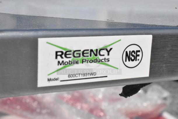 Regency 600CT1931WD stainless steel 3-tier cart label, NSF certified, new with scratches, on commercial casters.