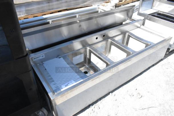 BRAND NEW Regency 600B31014213 stainless steel 3 bay back bar sink with dual drain boards, minor scratches.