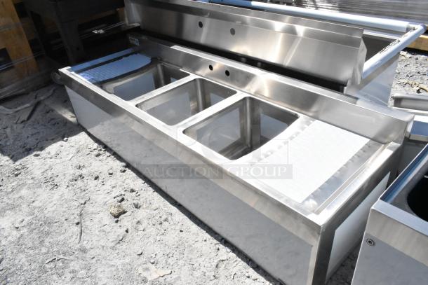 Regency stainless steel 3-bay back bar sink with dual drain boards, new with minor scratches. Model 600B31014213.