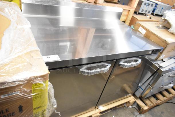 Brand new Blue Air BLUR48-HC stainless steel 2-door worktop cooler, 115V, 1 phase, minor scratches and dents visible.