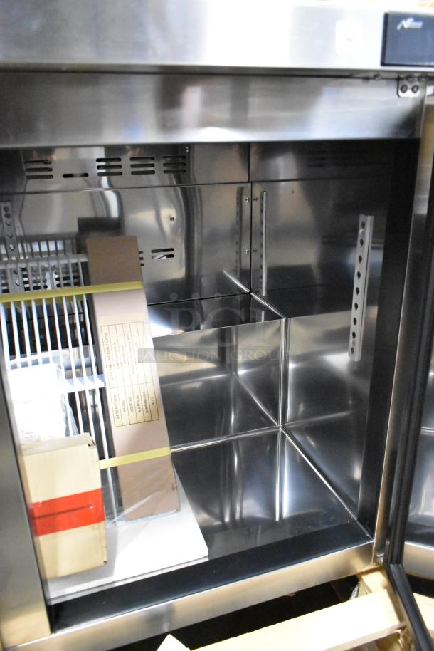 BRAND NEW Blue Air BLUR48-HC stainless steel commercial 2-door work top cooler, 115V, 1 Phase. Interior shelving visible.