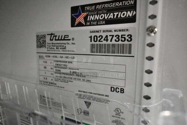 2021 True GDM-41SL-54-HC-LD 2-door cooler tag, serial 10247353, 115V, 1 phase, poly-coated racks. USA-made.