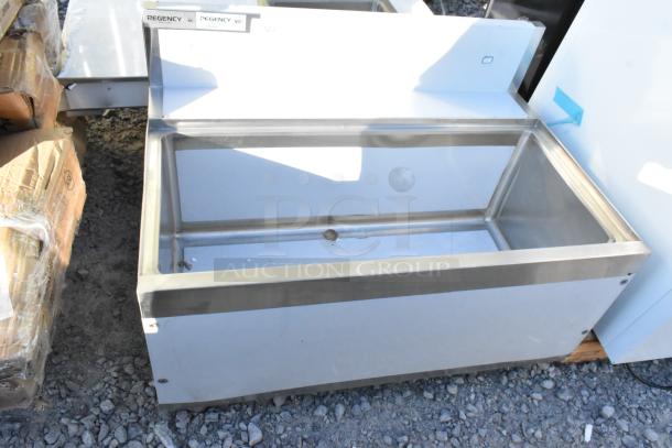 BRAND NEW Regency 600IB2436S Spec Line 24"x36" underbar ice bin, stainless steel, 119 lb capacity, minor cosmetic flaws.