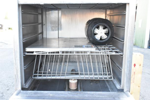 LVO FL14E stainless steel front load pot and pan washer. Features racks and internal components. 460V, 3-phase model.