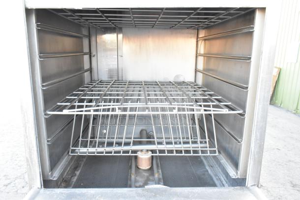 LVO FL14E stainless steel commercial pot and pan washer, front load, 460 volts, 3 phase, interior view with racks.
