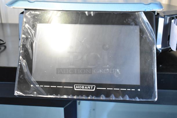 Brand new 2024 Hobart HTi metal countertop food portioning scale in box, 120/208-240 volts, 1 phase, protective film intact.