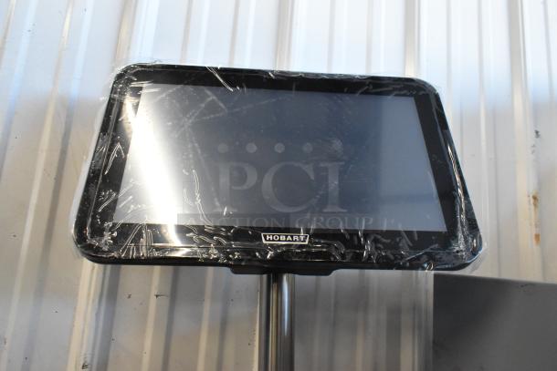 Brand new Hobart HTi food portioning scale, sealed, touchscreen display, 120/208-240V, 1 phase.