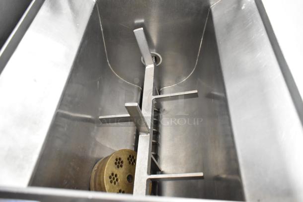 Italgi P35A stainless steel commercial pasta extruder interior, featuring mixing paddles and die, 220 volts.