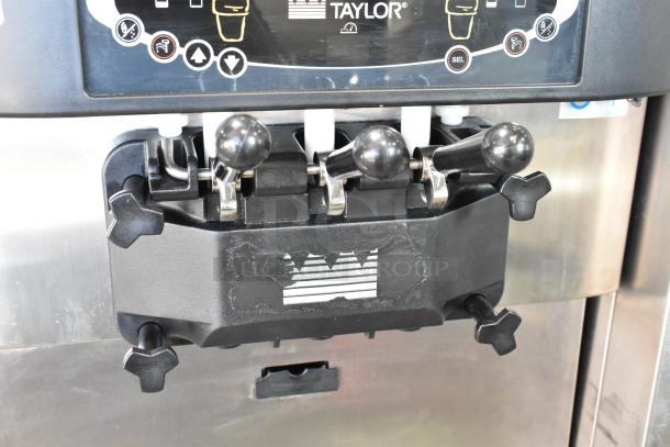 Taylor C723-33 stainless steel soft serve ice cream machine, 2 flavors with twist, on casters. 208-230V, 3 phase.