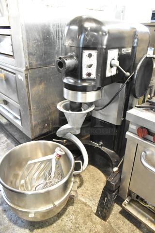 Hobart L-800 commercial 80-quart dough mixer with bowl, dough hooks, paddle, whisk, 230V, 1-phase; shows controls and attachments.