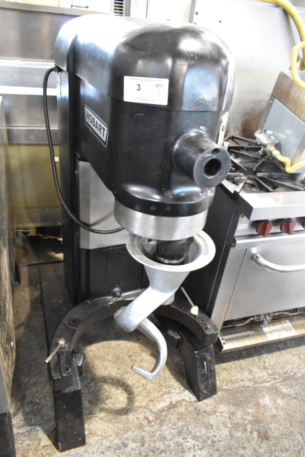 Hobart L-800 commercial 80-quart dough mixer with bowl, dough hooks, paddle, and whisk. 230V, 1 phase, good condition.