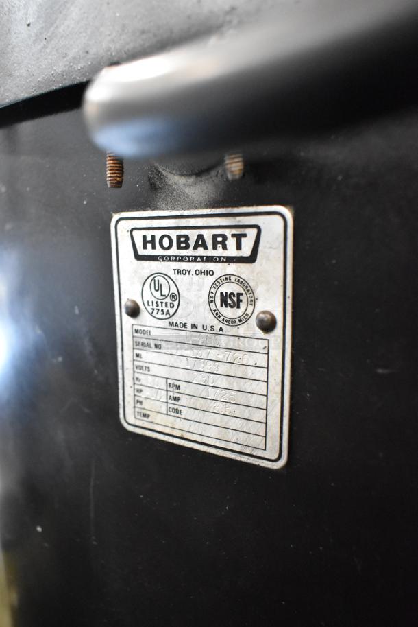 Hobart L-800 commercial dough mixer label showing model, serial number, and voltage details.