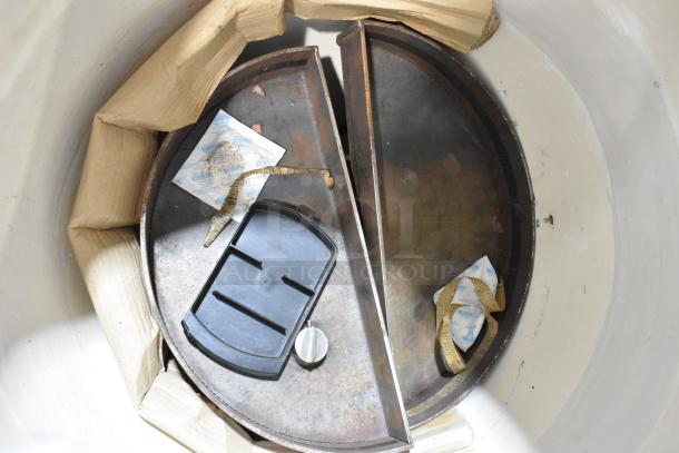 Toastmaster TCT-1627 R Stainless Steel Natural Gas Tandoor Oven, 85,500 BTU, shown with commercial casters, interior view.