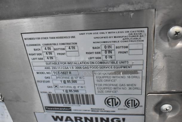 Toastmaster TCT-1627 R stainless steel gas tandoor oven label, 85,500 BTU, commercial use, installation and clearance details.