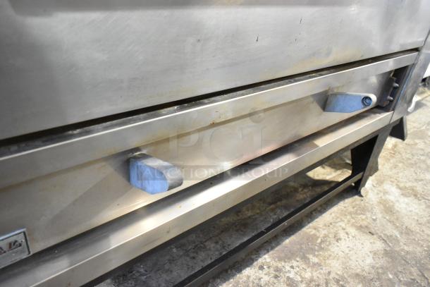 Marsal & Sons SD 660 stainless steel single deck pizza oven with cooking stones, natural gas powered, used condition.