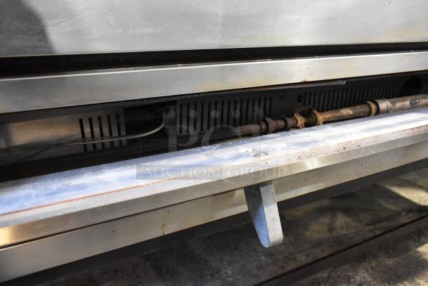 Marsal & Sons SD 660 stainless steel single deck pizza oven with cooking stones, natural gas powered, visible wear.