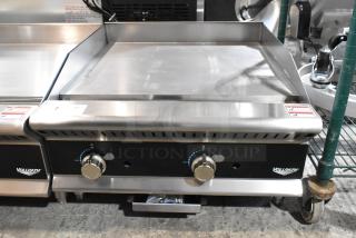Brand new Vollrath GGMDM-24 stainless steel 24" medium-duty countertop griddle with manual controls, 56,000 BTU, scratch and dent condition.