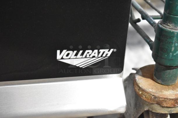 Alt text: Vollrath GGMDM-24 stainless steel commercial griddle, 24", with "Vollrath" logo visible. Brand new with minor scratches.