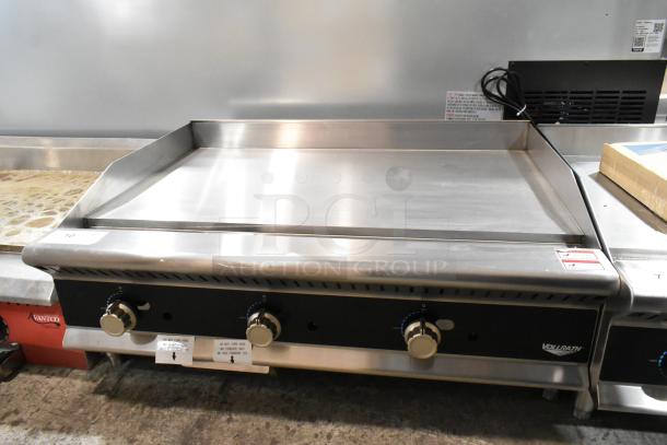 Brand new Vollrath GGMDM-36 stainless steel 36" medium-duty griddle. Natural gas, 84,000 BTU, manual controls.