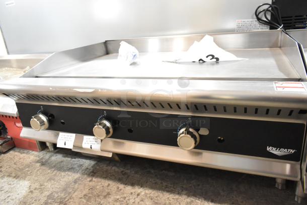 Brand new Vollrath GGMDM-36 stainless steel 36" gas griddle, manual controls, 84,000 BTU, scratch and dent condition.