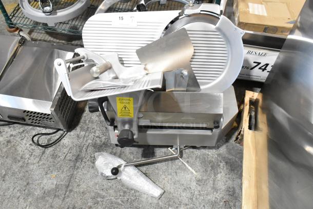 Estella 348SLAS13 stainless steel commercial meat slicer, 13" blade, blade sharpener, manual option, new with scale tag.