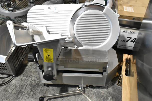 New Estella 348SLAS13 stainless steel 13" meat slicer with blade sharpener, manual use option. Includes safety labels.