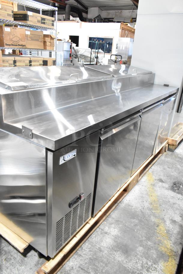 Brand new Avantco 178SSPPT3 stainless steel pizza prep table, commercial casters, 115V, 1 phase, slight scratches.