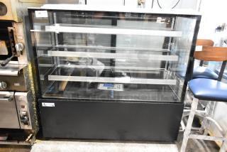 Avantco 193BCF60B refrigerated bakery display case with square glass, black finish, and visible top glass damage. 115V, 1 Phase.