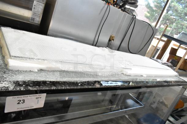 Brand new Avantco 193BCF60B 59 1/8" black refrigerated bakery display case with top glass damage. 115 volts, 1 phase.