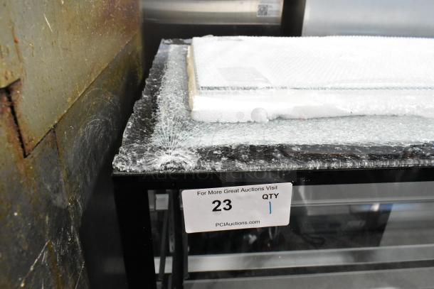 Brand new Avantco 193BCF60B bakery display case with top glass damage. 59 1/8", black, refrigerated, 115V, 1-phase.