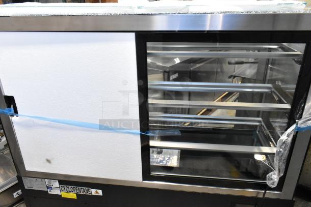 Brand new Avantco 193BCF60B 59" black refrigerated bakery display case with visible top glass damage. 115V, 1 Phase.