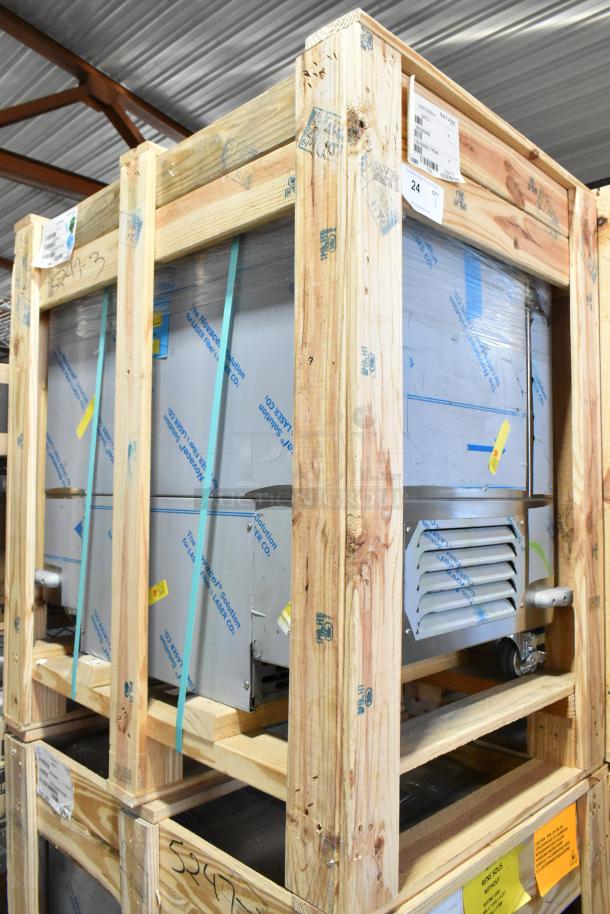 Brand new 2022 H&K 52473-1 stainless steel commercial French fry freezer in crate, features fry basket holder and casters.