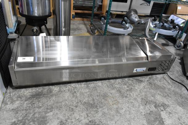 Brand new scratch and dent Avantco 360CPT54 54" stainless steel refrigerated prep rail, 115V, 1 Phase, visible minor exterior blemishes.