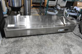 Brand new scratch and dent Avantco 360CPT54 54" stainless steel refrigerated prep rail, 115V, 1 Phase, visible minor exterior blemishes.