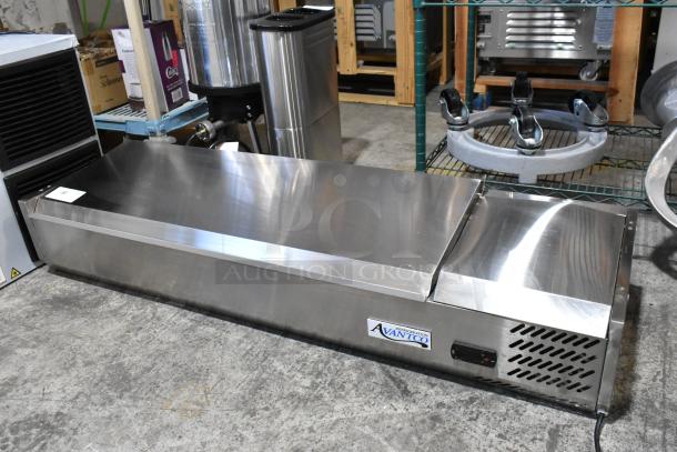 Brand new Avantco 360CPT54 stainless steel 54" refrigerated prep rail, 115V, 1 phase, with minor scratches and dents.