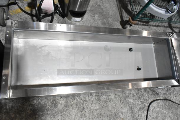 Brand new Avantco 360CPT54 stainless steel 54" countertop refrigerated prep rail with minor scratches. 115V, 1 phase.