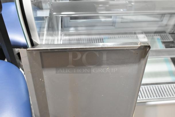 Brand new Avantco 360CPT54 54" stainless steel prep rail with visible scratches. Powered by 115 volts, 1 phase.