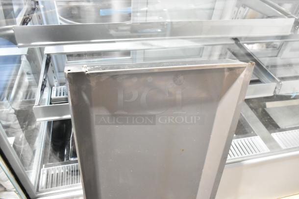 BRAND NEW SCRATCH AND DENT Avantco 360CPT54 stainless steel 54" refrigerated prep rail; minor cosmetic dents visible.
