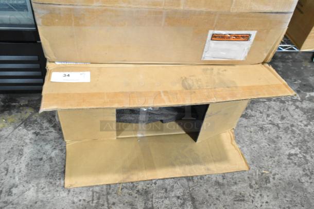Box containing BRAND NEW Roam MTC 6003 IESHK2 Power Input Box, labeled "Packing List Enclosed" and number "34".