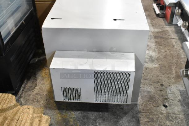 Two white metal boxes with ventilation holes, showing minor wear. Ready for dual bid auction; sturdy construction.