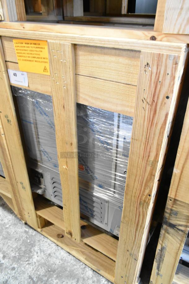 Brand new 2022 H&K 52473-1 stainless steel commercial French fry freezer, crated with label warnings. 115V, 1 phase, on casters.