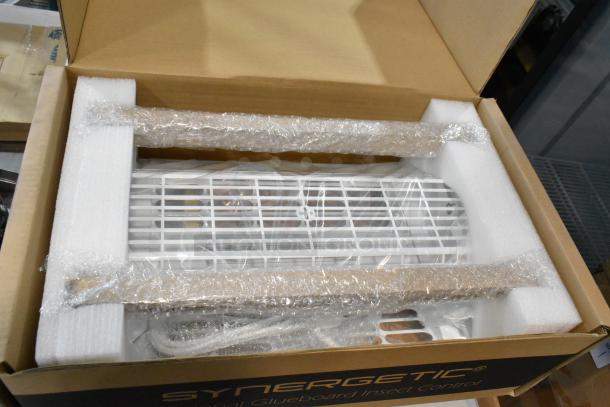 Brand new FTP30 W Insect Light Trap in box, slight scratches and dents. Includes protective packaging and visible label.