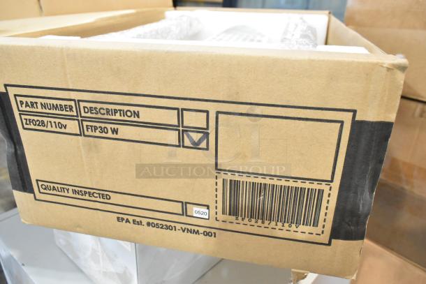 Cardboard box labeled FTP30 W Insect Light Trap, part number ZF028/110V. Box shows "Quality Inspected" marking.